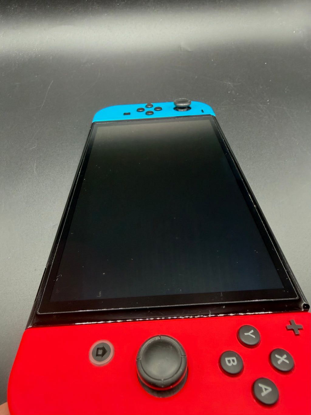 Nintendo Switch OLED – Röd/Blå - 7" Oled